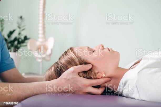 A girl receiving CST treatment.